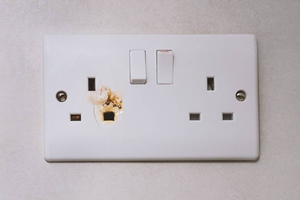 Faulty electrical socket warning signs